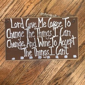 Hand painted wooden sign with wire and bow for hanging.  H 5 1/2 in. W 9 in.